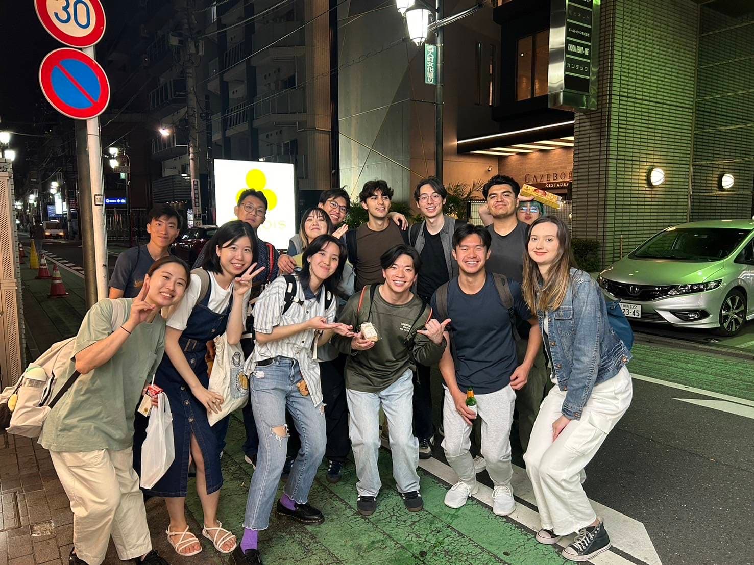 Our climbing friends together on a Tokyo street at night
